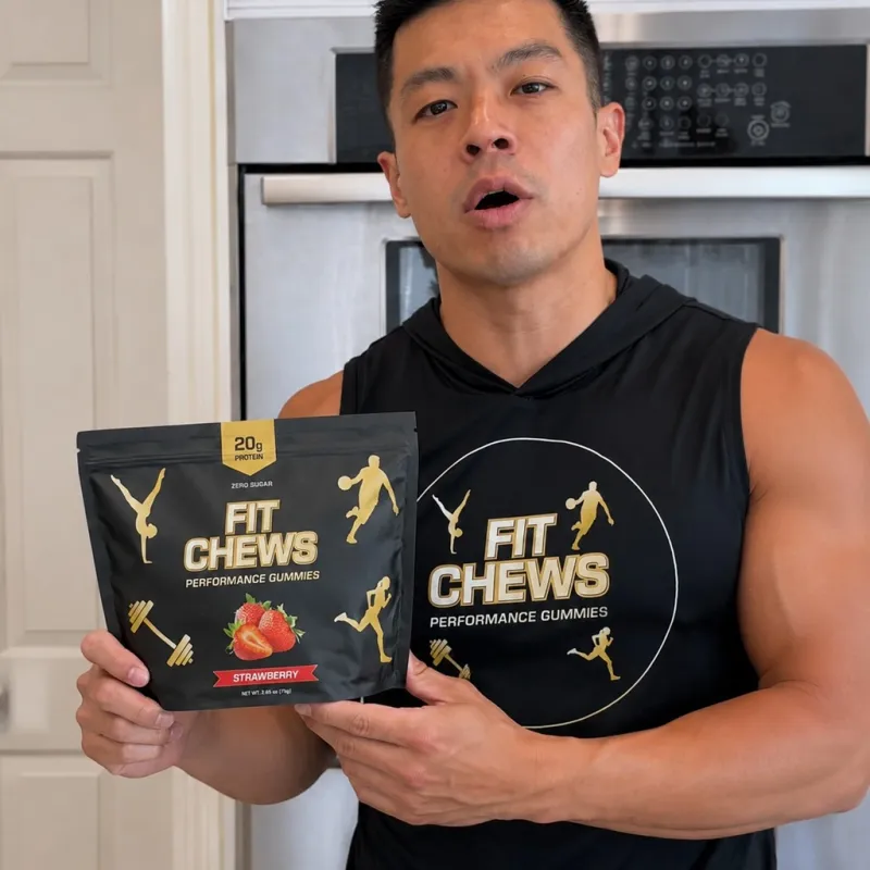 Bert holding the delivered Fit Chews sample pouch at home